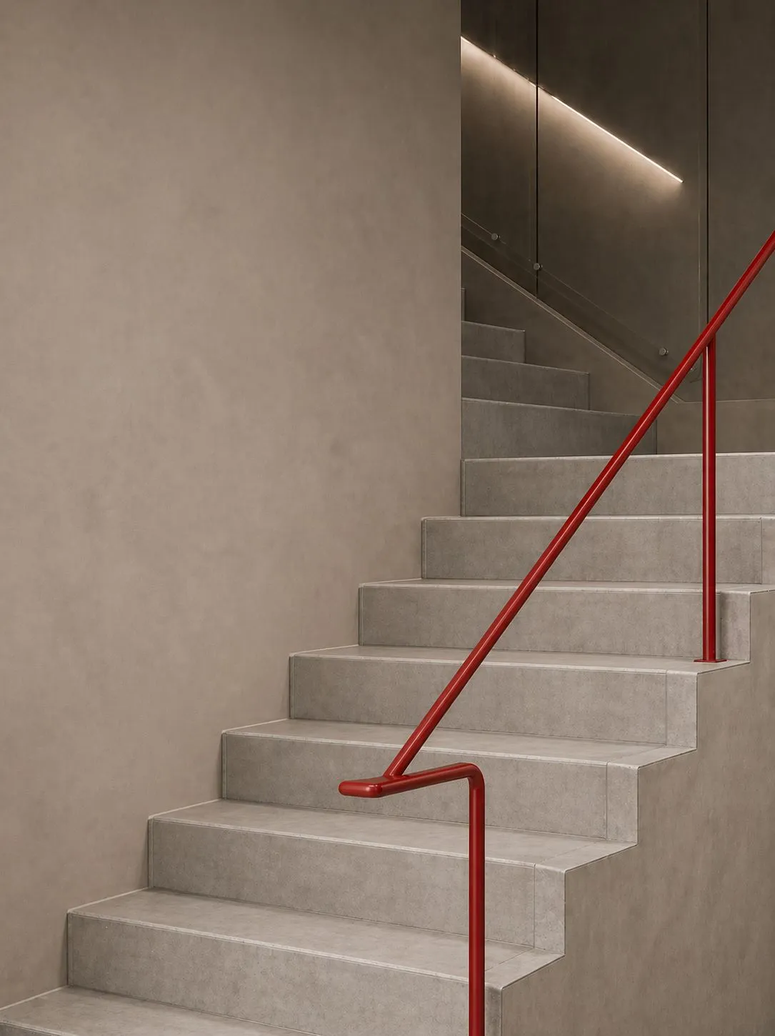 La escalera al laboratorio, con su baranda roja
